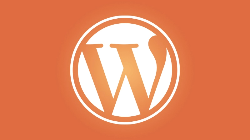 Logo WordPress blanc sur fond orange